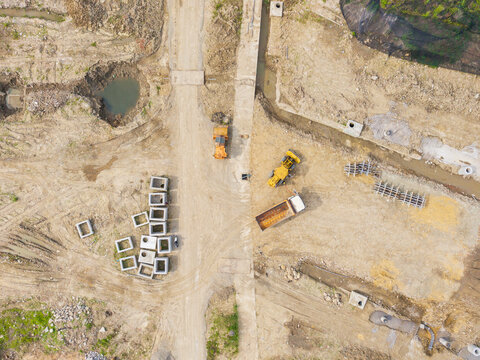 Aerial View of Urban Development Site with Heavy Machinery