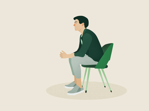 Pensive man sitting on chair and waiting