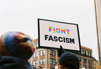 Film photo of "Fight Fascism" political sign at public rally
