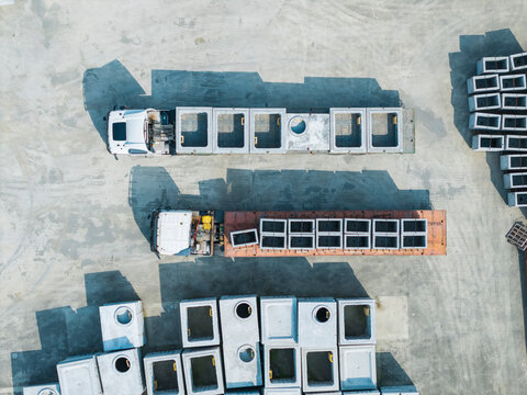 Concrete Structures Transport by Trucks Aerial View