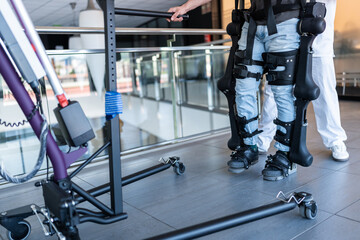Patient using exoskeleton robotic legs for physical therapy