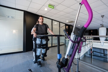 Patient using exoskeleton robotic suit walking