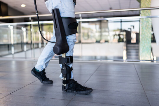 Patient walking using exoskeleton robotic leg in rehabilitation center