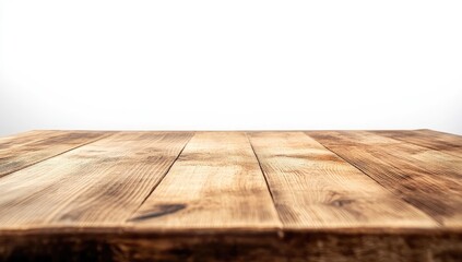 Close-up of a weathered wooden table top against a plain white background