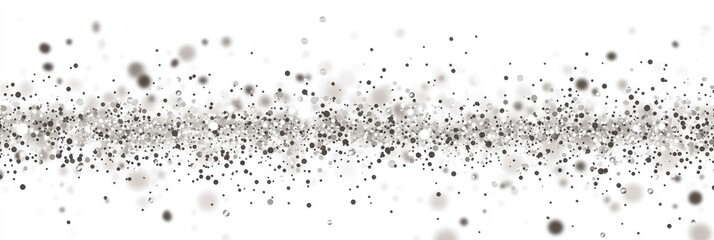 Abstract grey particles scattered across a white background