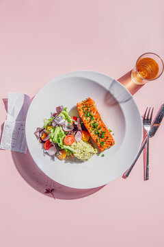 Grilled salmon with guacamole salad