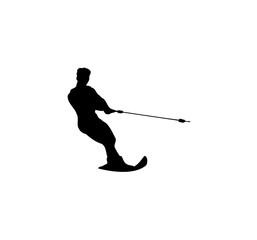Silhouette of a water skier gracefully gliding across the water, holding the tow rope.