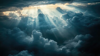 Naklejka premium Sunlight piercing dark clouds