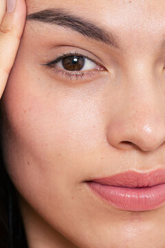 Extreme Close-Up of Woman's Eye, Skin, and Lips with Natural Makeup