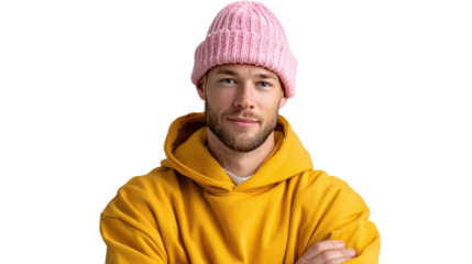 Stylish Man in Pink Hat: A modern man dons a stylish pink beanie paired with a vibrant yellow hoodie, exuding casual confidence and a contemporary urban aesthetic.