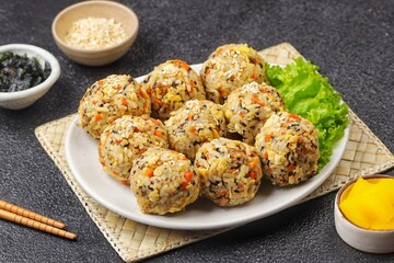 Korean rice balls or Jumeokbap (주먹밥) are a quick and easy snack or lunch made with leftover rice and various fillings that are shaped into a ball