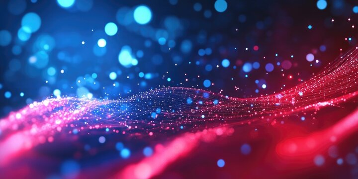 Abstract digital art with vibrant blue and red particles. A dynamic display of swirling, glowing particles