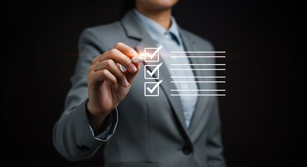 A businesswoman is checking off items on a digital checklist