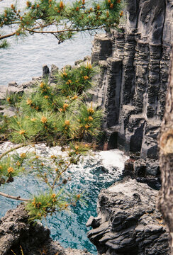 Volcanic rock coastline with hexagonal basalt columns