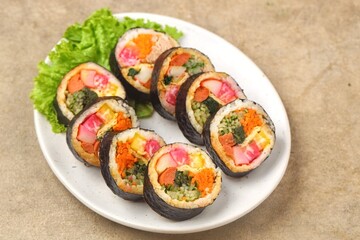 Kimbap or also known as gimbap is a typical Korean rice roll