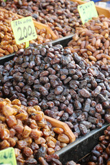 Variety of dates displayed at a local market stall