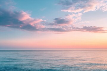Obraz premium Pastel sunset over tranquil ocean