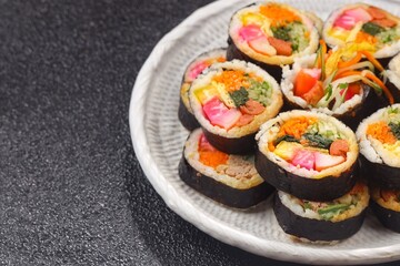 Kimbap or also known as gimbap is a typical Korean rice roll