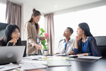 Business asian Multicultural businesspeople working project  working together in office conference ideas in startup at office Diversity leadership and business people