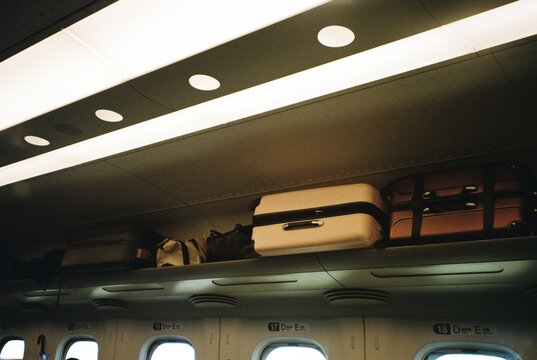 Luggage Stored Above Seats in Japanese Bullet Train