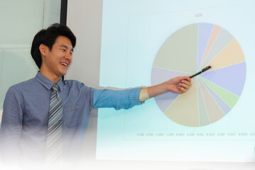 Motivated professional team members gathered together at corporate seminar raise hand, agree with...