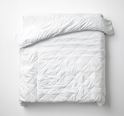 Obraz premium White quilted comforter on a bed, top view
