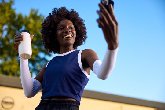 Joyful athlete captures a selfie