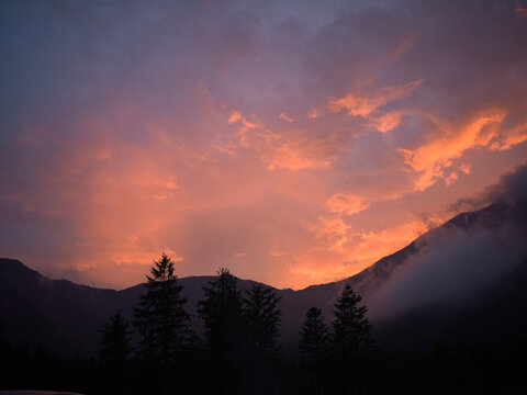 Burning Sky Over Silent Mountains