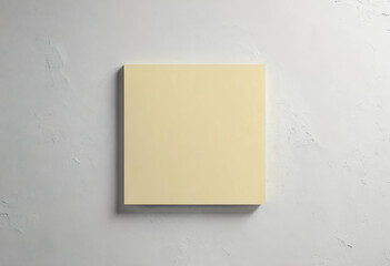 Yellow paper mockup attached to the wall forming a frame, with a white wall, frame background.