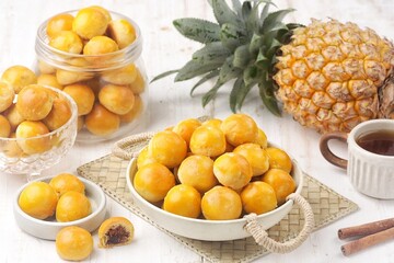 Nastar is a dry cake made from a mixture of wheat flour, butter and eggs filled with pineapple jam