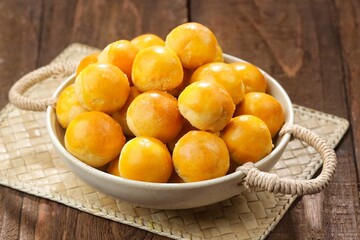 Nastar is a dry cake made from a mixture of wheat flour, butter and eggs filled with pineapple jam