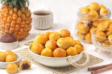 Nastar is a dry cake made from a mixture of wheat flour, butter and eggs filled with pineapple jam