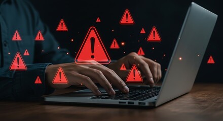 Man uses laptop with warning signs indicating a security threat