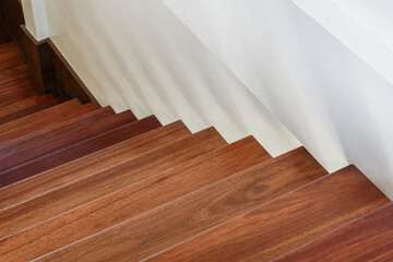 Wood staircase inside contemporary white modern house,stairs apartment architecture design house interior modern,stairs and railing.