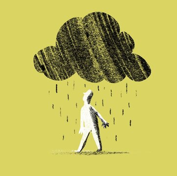 Man standing under a rain cloud