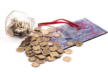 Conceptual story about pensions in Kazakhstan with a 10,000 Kazakhstani tenge banknote made of...