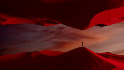 Silhouette of a man against vivid surreal landscape at sunset