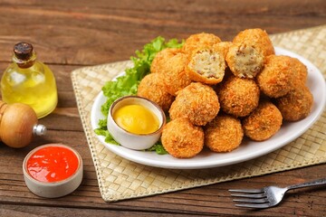 Bitterballen is the name of a type of food in the Netherlands. Bitterballen taste similar to croquettes, but are small round shapes about 3 to 4 cm