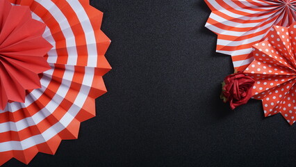 Independence Day Indonesia banner mockup with Indonesia flag color paper fans isolated on black background