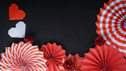 Independence Day Indonesia banner mockup with flag decoration and Indonesia flag color paper fans isolated on black background