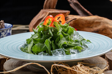 Chilled Andrographis paniculata in a celadon plate