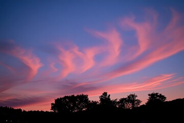 Pink sunset clouds, wispy layers