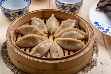 Bashang Zhangyuan delicacy oat noodle steamed dumplings in a steamer