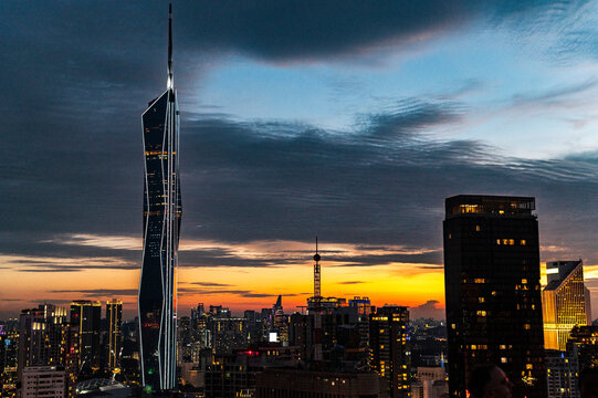 Merdeka 118 tower over illuminated cityscape