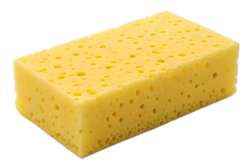 Yellow porous sponge for cleaning, washing, and household chores on black