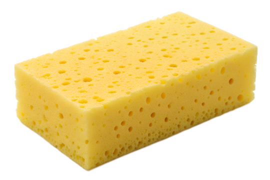 Yellow porous sponge for cleaning, washing, and household chores on black
