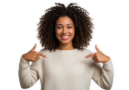 Woman with curly hair pointing downwards with both hands here on transparent background