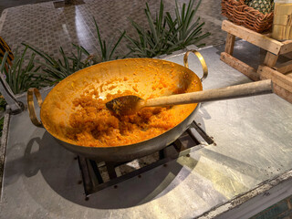 Thai Pineapple Jam Filling Being Cooked in Brass Wok for Traditional Cookies and Pastries
