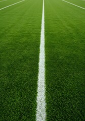 Obraz premium Thick horizontal white painted line is running across green grass turf in flat vector illustration, wallpaper, a green grass field with a thick white line running horizontally across the center. 