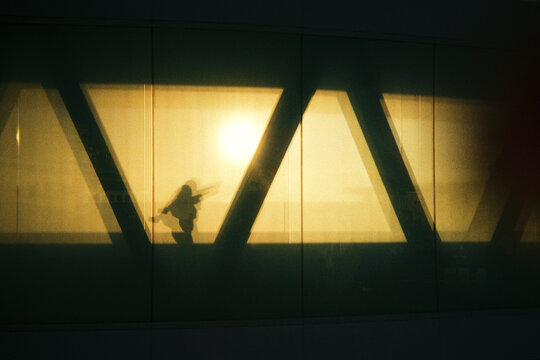 Shadow reflection of a woman opening arms 

